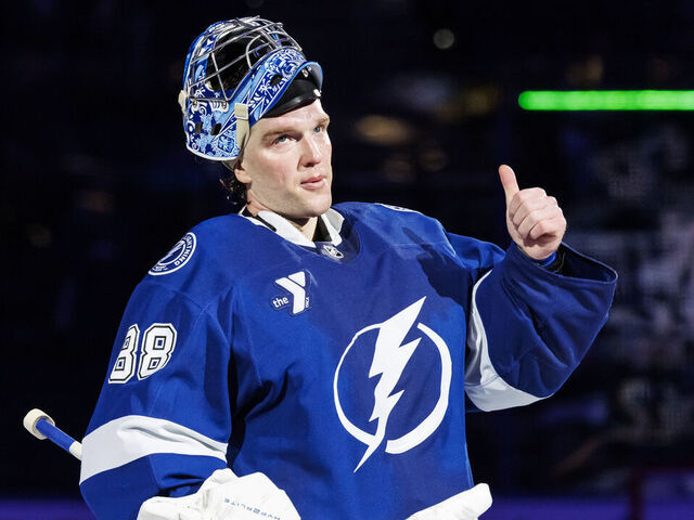 TAMPA, FL - FEBRUARY 27: Andrei Vasilevskiy #88 of the Tampa Bay Lightning celebrates the win against the Calgary Flames at Amalie Arena on February 27, 2025 in Tampa, Florida.
