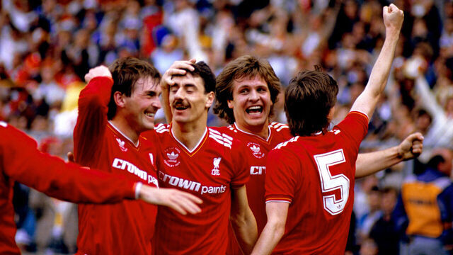 (L-R) Liverpool's Kenny Dalglish, Jan Molby and Ronnie Whelan congratulate Ian Rush (second l) on one of his two goals