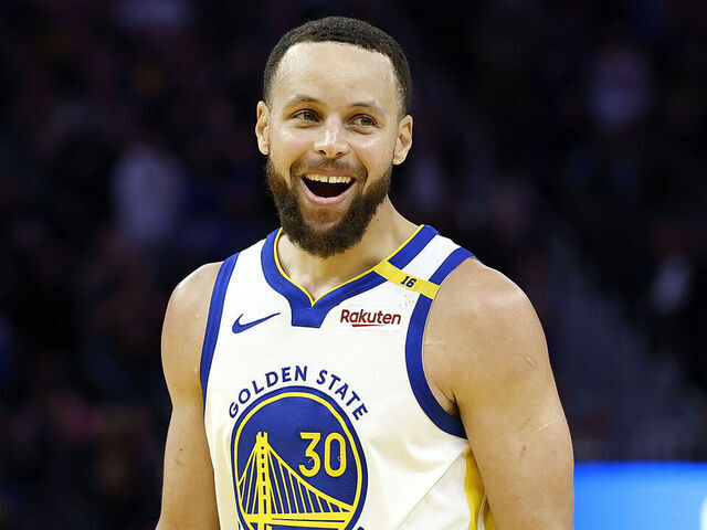 SAN FRANCISCO, CALIFORNIA - MARCH 08: Stephen Curry #30 of the Golden State Warriors reacts after Draymond Green #23 made a three-point shot late in the fourth quarter against the Detroit Pistons at Chase Center on March 08, 2025 in San Francisco, California.