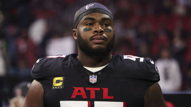 ATLANTA, GEORGIA - JANUARY 05: Grady Jarrett #97 of the Atlanta Falcons looks on from the sideline during the national anthem prior to an NFL football game against the Carolina Panthers at Mercedes-Benz Stadium on January 5, 2025 in Atlanta, Georgia.