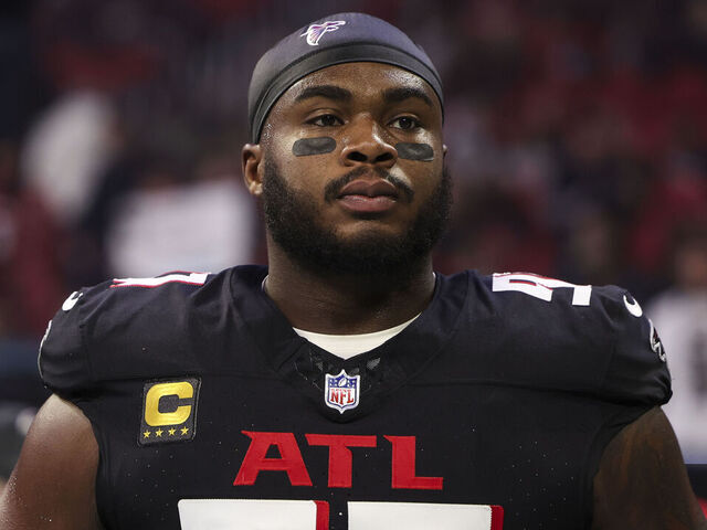 ATLANTA, GEORGIA - JANUARY 05: Grady Jarrett #97 of the Atlanta Falcons looks on from the sideline during the national anthem prior to an NFL football game against the Carolina Panthers at Mercedes-Benz Stadium on January 5, 2025 in Atlanta, Georgia.