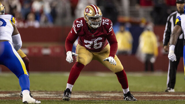 SANTA CLARA, CALIFORNIA - DECEMBER 12: Jaylon Moore #76 of the San Francisco 49ers defends during an NFL Football game against the Los Angeles Rams at Levi's Stadium on December 12, 2024 in Santa Clara, California.