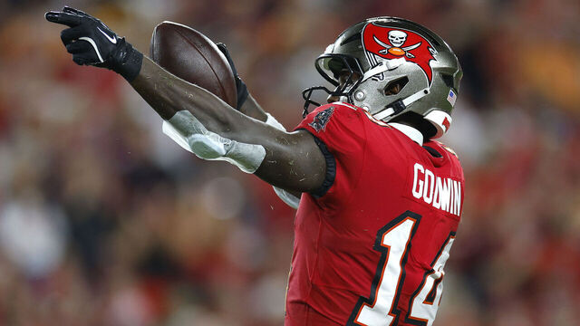 TAMPA, FLORIDA - OCTOBER 21: Chris Godwin #14 of the Tampa Bay Buccaneers reacts after making a first down during the second quarter against the Baltimore Ravens at Raymond James Stadium on October 21, 2024 in Tampa, Florida.