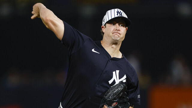 TAMPA, FLORIDA - FEBRUARY 28: Gerrit Cole #45 of the New York Yankees throws a warm up pitch in the second inning during a spring training game against the Toronto Blue Jays at George M. Steinbrenner Field on February 28, 2025 in Tampa, Florida.