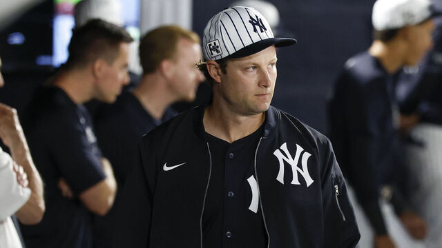 TAMPA, FLORIDA - FEBRUARY 28: Gerrit Cole #45 of the New York Yankees walks through the dugout in the first inning during a spring training game against the Toronto Blue Jays at George M. Steinbrenner Field on February 28, 2025 in Tampa, Florida.