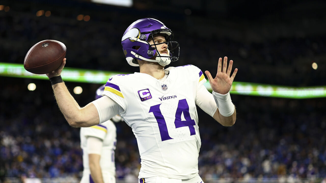 DETROIT, MICHIGAN - JANUARY 5: Sam Darnold #14 of the Minnesota Vikings warms up prior to an NFL football game against the Detroit Lions at Ford Field on January 5, 2025 in Detroit, Michigan.