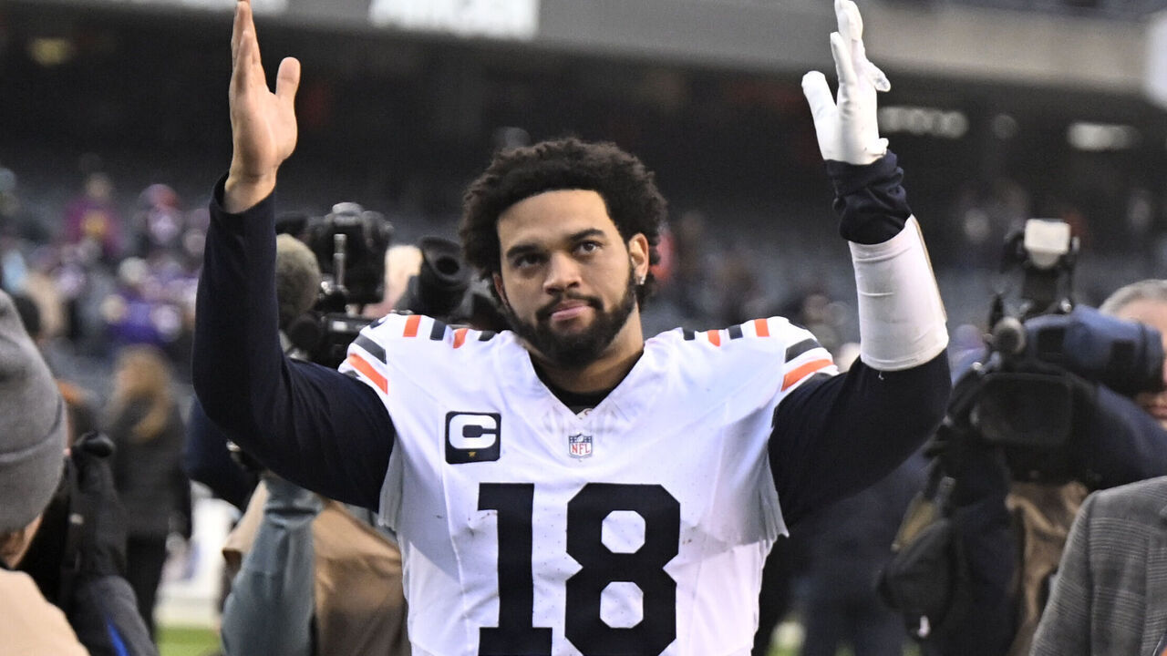 CHICAGO, ILLINOIS - NOVEMBER 24: Caleb Williams #18 of the Chicago Bears reacts after a 30-27 overtime loss against the Minnesota Vikings at Soldier Field on November 24, 2024 in Chicago, Illinois.