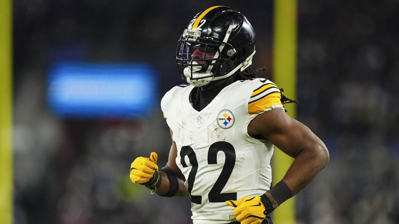 BALTIMORE, MD - JANUARY 11: Najee Harris #22 of the Pittsburgh Steelers runs across the field during an NFL football wild card playoff game against the Baltimore Ravens at M&T Bank Stadium on January 11, 2025 in Baltimore, Maryland.