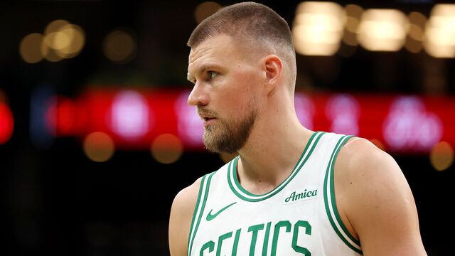 BOSTON, MASSACHUSETTS - JANUARY 27: Kristaps Porzingis #8 of the Boston Celtics looks on during the second quarter at TD Garden on January 27, 2025 in Boston, Massachusetts.