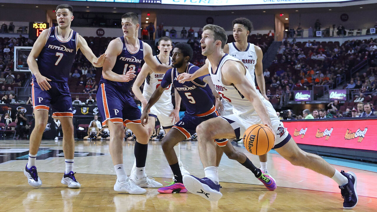 LAS VEGAS, NEVADA - MARCH 10: Augustas Marciulionis #3 of the Saint Mary's Gaels drives against the Pepperdine Waves in the second half of a semifinal game of the West Coast Conference men's basketball tournament at the Orleans Arena on March 10, 2025 in Las Vegas, Nevada. The Gaels defeated the Waves 74-59.