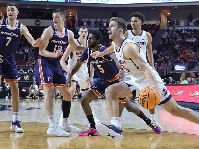 LAS VEGAS, NEVADA - MARCH 10: Augustas Marciulionis #3 of the Saint Mary's Gaels drives against the Pepperdine Waves in the second half of a semifinal game of the West Coast Conference men's basketball tournament at the Orleans Arena on March 10, 2025 in Las Vegas, Nevada. The Gaels defeated the Waves 74-59.