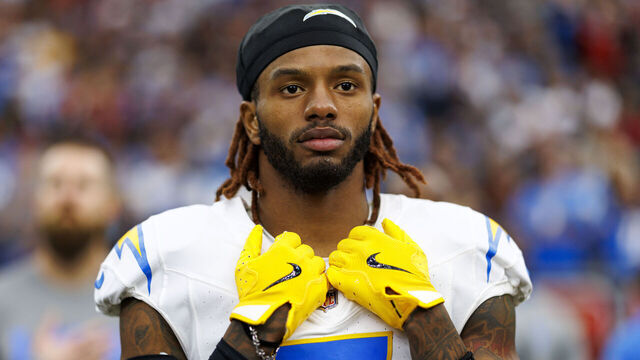 HOUSTON, TEXAS - JANUARY 11: Cornerback Kristian Fulton #7 of the Los Angeles Chargers stands on the sidelines during the national anthem prior to an AFC Wild Card game against the Houston Texans at NRG Stadium on January 11, 2025 in Houston, Texas.