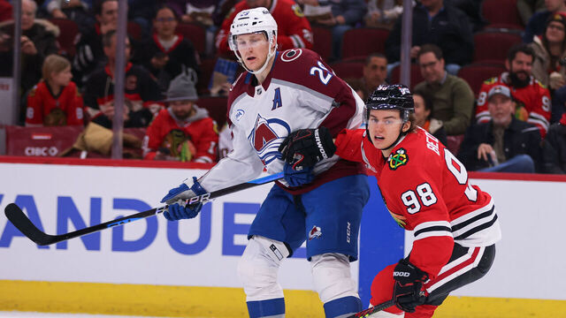CHICAGO, IL - JANUARY 08: Connor Bedard #98 of the Chicago Blackhawks and Nathan MacKinnon #29 of the Colorado Avalanche during the second period on January 8, 2024 at the United Center in Chicago, Illinois.