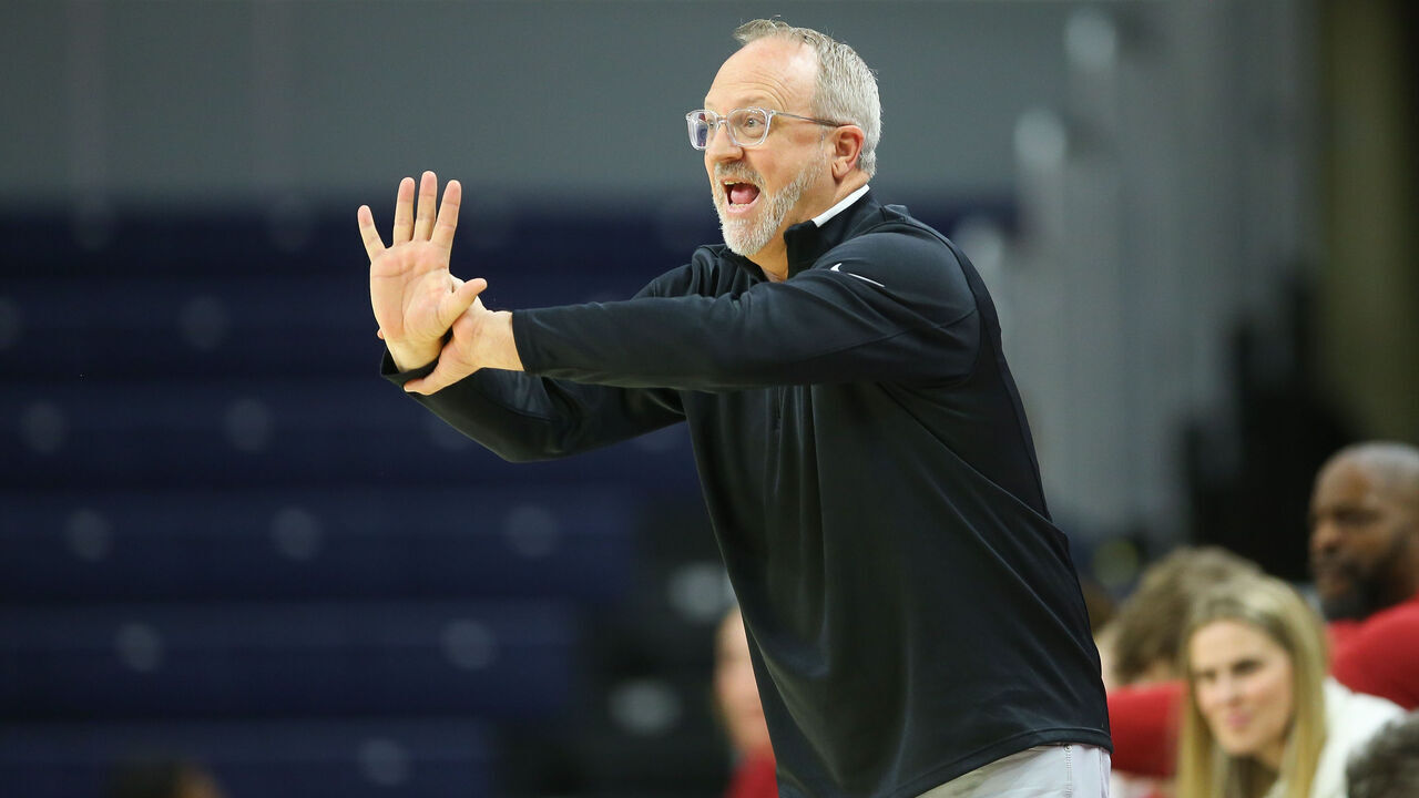 AUBURN, ALABAMA - JANUARY 9: Head coach Mike Neighbors of the Arkansas Razorbacks asks for a call during the first half against the Auburn Tigers at Neville Arena on January 9, 2025 in Auburn, Alabama.