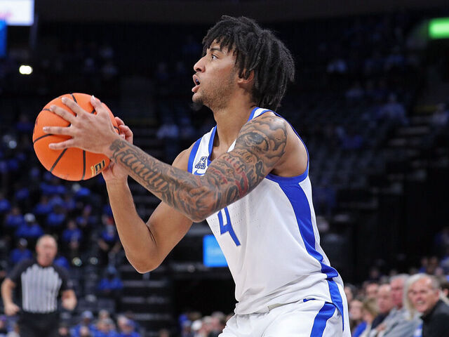 MEMPHIS, TENNESSEE - FEBRUARY 09: PJ Haggerty #4 of the Memphis Tigers takes a shot during the game against the Temple Owls at FedExForum on February 09, 2025 in Memphis, Tennessee.