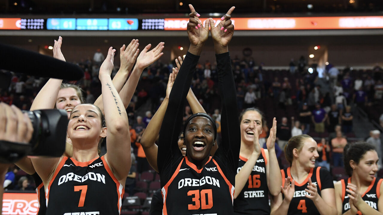 LAS VEGAS, NEVADA - MARCH 10: Catarina Ferreira #30 of the Oregon State Beavers and teammates celebrate defeating the Gonzaga Bulldogs 63-61 in a semifinal game of the West Coast Conference women's basketball tournament at the Orleans Arena on March 10, 2025 in Las Vegas, Nevada.