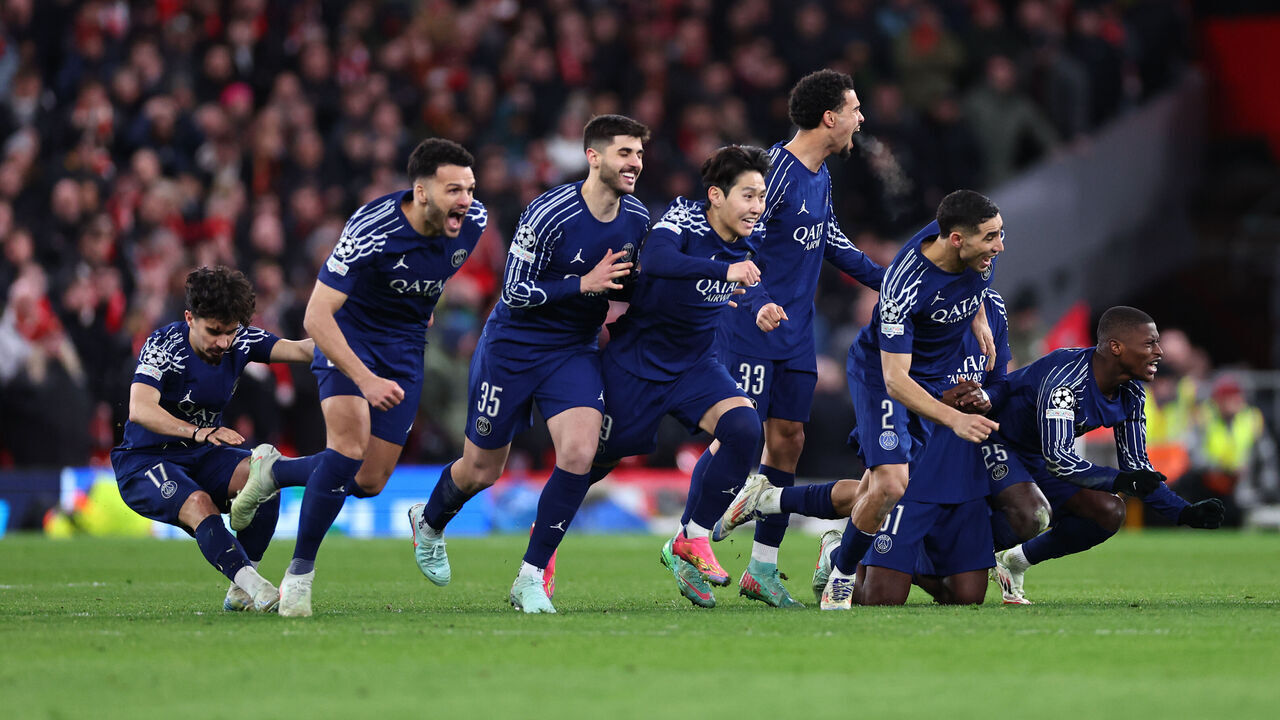 LIVERPOOL, ENGLAND - MARCH 11: Players of PSG celebrate winning the penalty shoot out during the UEFA Champions League 2024/25 UEFA Champions League 2024/25 Round of 16 Second Leg match between Liverpool FC and Paris Saint-Germain at Anfield on March 11, 2025 in Liverpool, England.