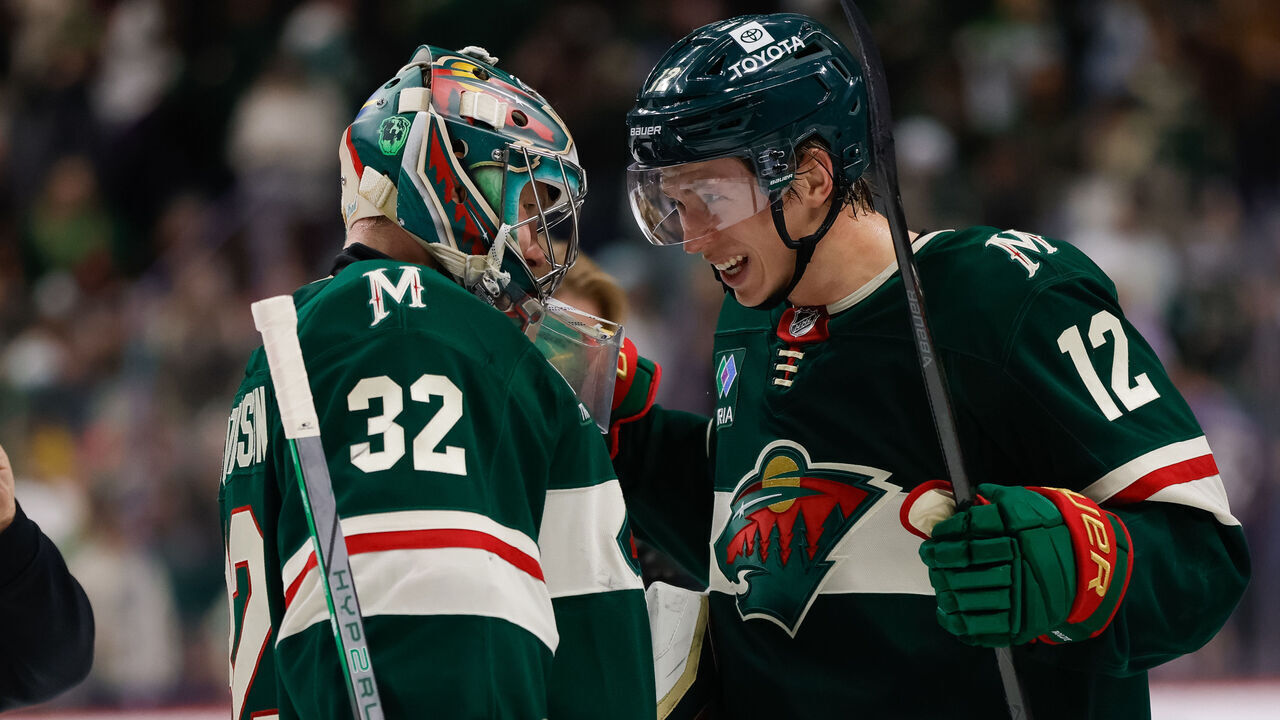 ST. PAUL, MN - MARCH 11: Minnesota Wild goaltender Filip Gustavsson (32) celebrates with left wing Matt Boldy (12) after winning an NHL game between the Colorado Avalanche and Minnesota Wild on March 11th, 2025, at the Xcel Energy Center in St. Paul, MN.
