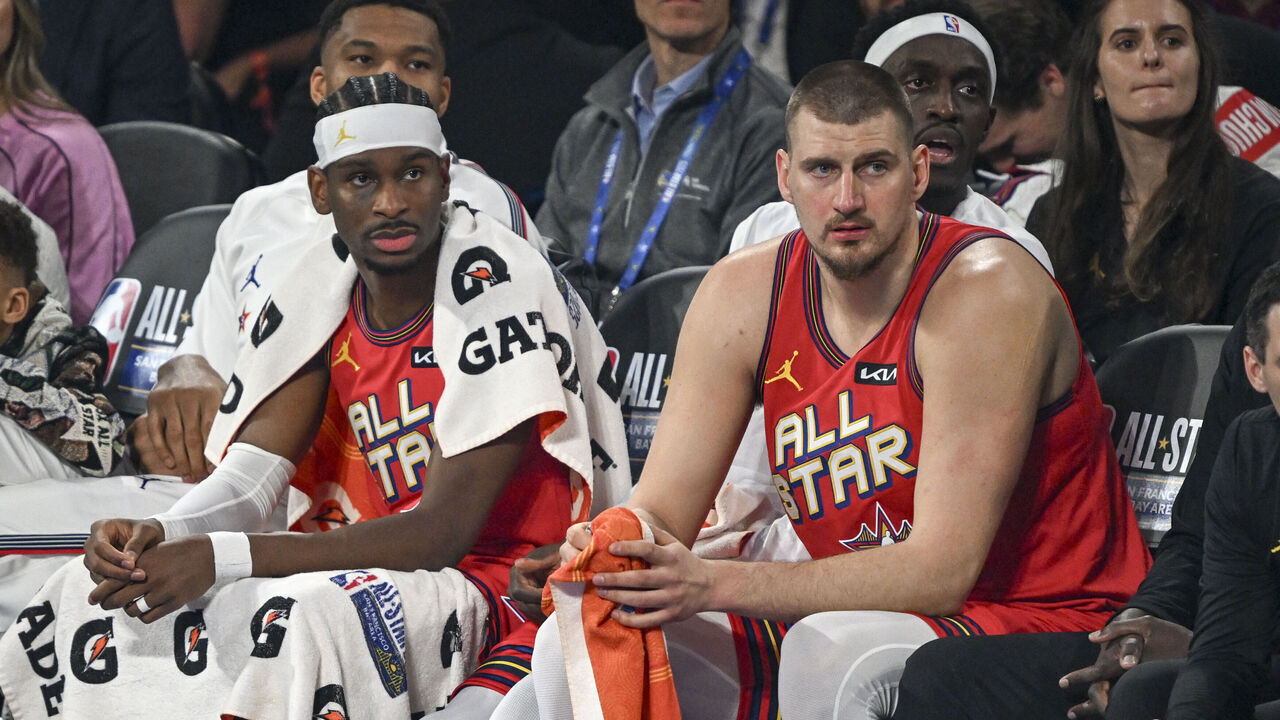 SAN FRANCISCO, CA - FEBRUARY 16: Shai Gilgeous-Alexander (2) of the Oklahoma City Thunder and Nikola Jokic (15) of the Denver Nuggets sit on the bench during the NBA All-Star Game at Chase Center in San Francisco, California on Sunday, February 16, 2025.
