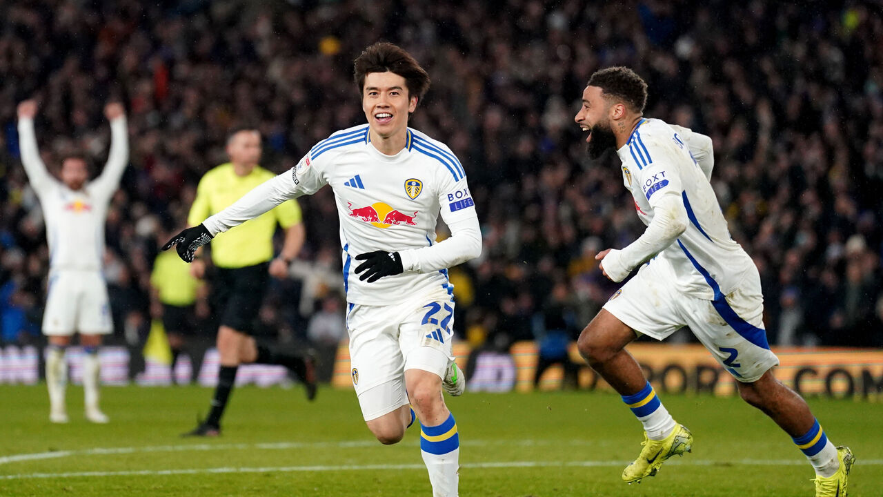 Leeds United's Ao Tanaka (left) celebrates after scoring his sides second goal during the Sky Bet Championship match at Elland Road, Leeds. Picture date: Wednesday March 12, 2025.