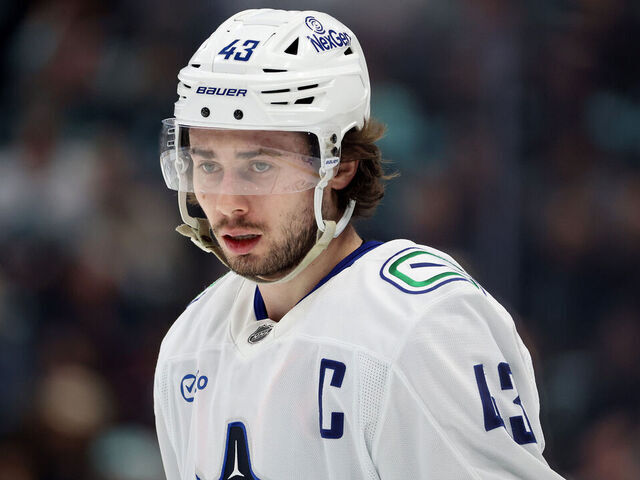 SEATTLE, WASHINGTON - MARCH 01: Quinn Hughes #43 of the Vancouver Canucks looks on during the first period against the Seattle Kraken at Climate Pledge Arena on March 01, 2025 in Seattle, Washington.