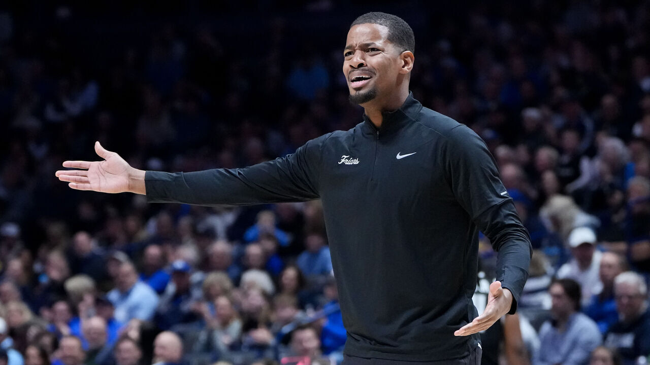 CINCINNATI, OHIO - MARCH 08: Head coach Kim English of the Providence Friars reacts in the first half against the Xavier Musketeers at the Cintas Center on March 08, 2025 in Cincinnati, Ohio.