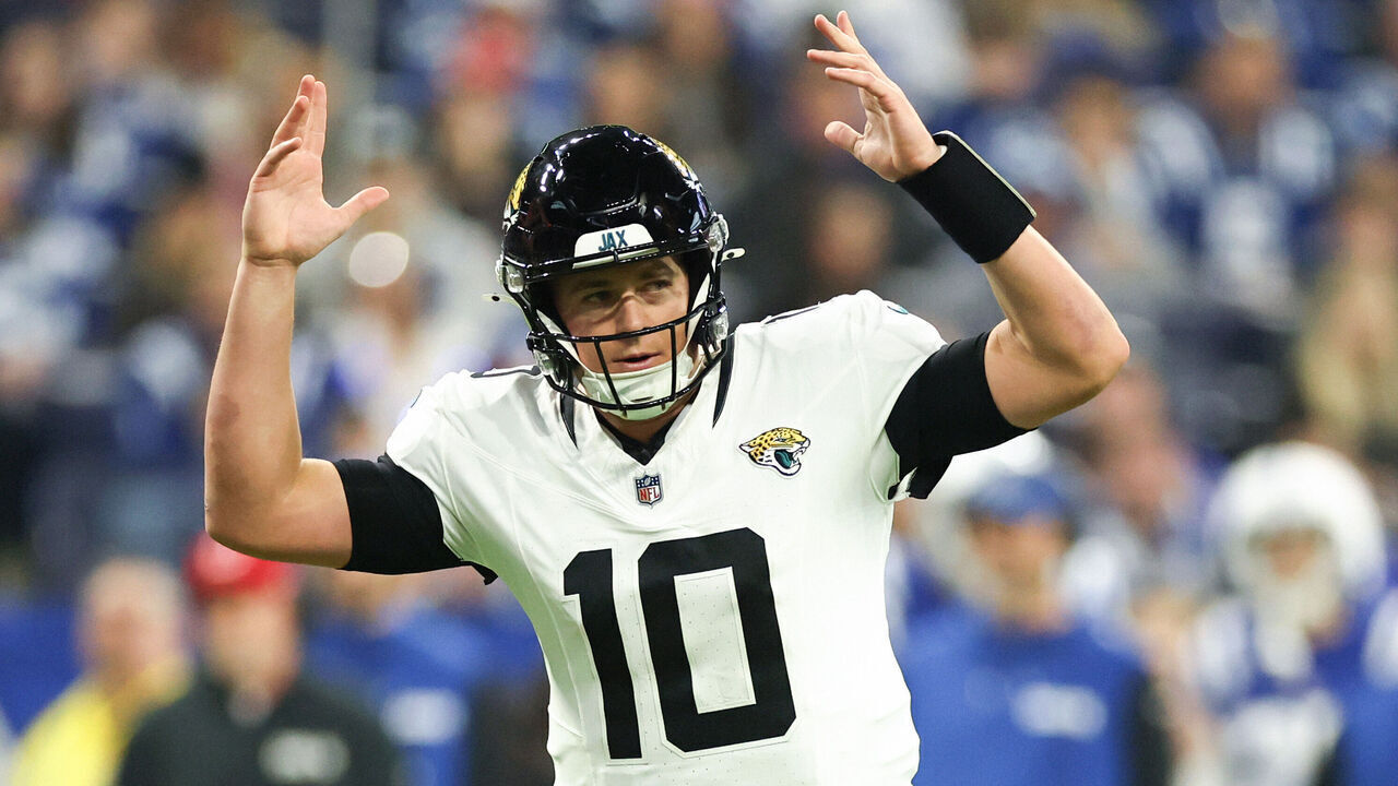 INDIANAPOLIS, INDIANA - JANUARY 05: Mac Jones #10 of the Jacksonville Jaguars celebrates after scoring a touchdown in the first quarter against the Indianapolis Colts at Lucas Oil Stadium on January 05, 2025 in Indianapolis, Indiana.
