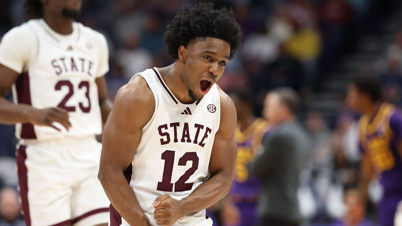 NASHVILLE, TENNESSEE - MARCH 12: Josh Hubbard #12 of the Mississippi State Bulldogs celebrates in the first half against the LSU Tigers during the SEC Men's Basketball Tournament - First Round at Bridgestone Arena on March 12, 2025 in Nashville, Tennessee.