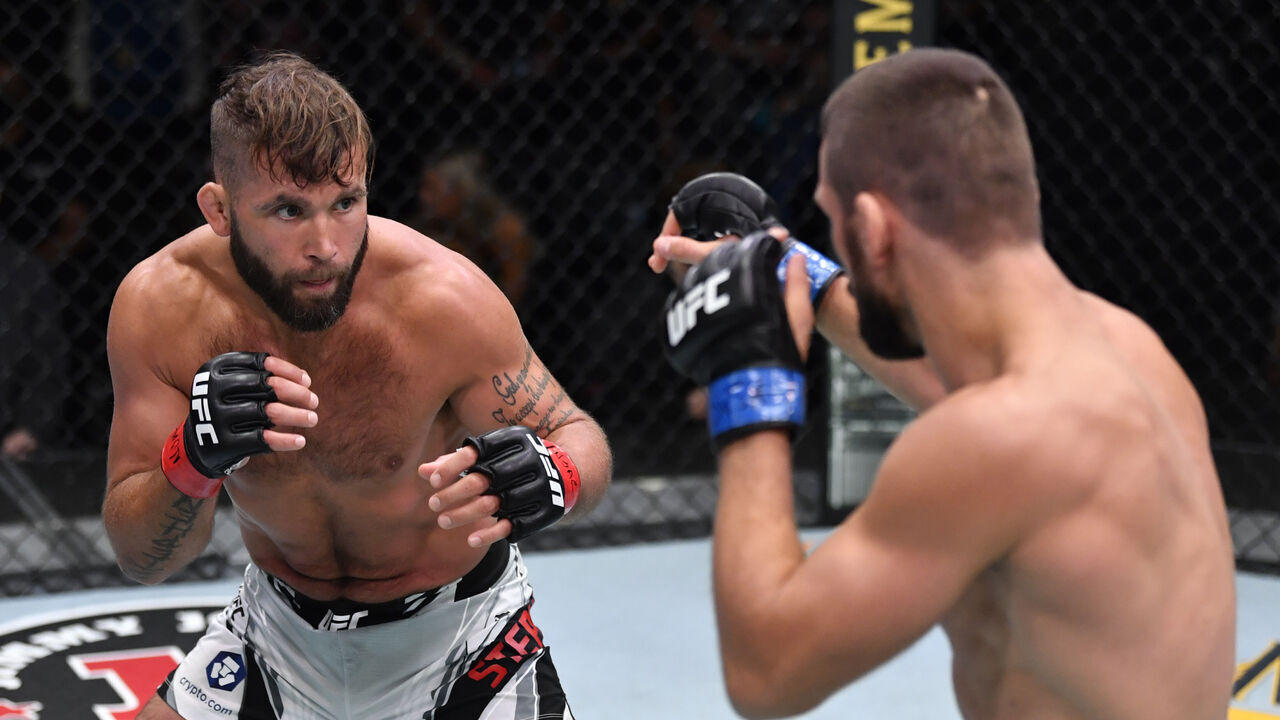 LAS VEGAS, NEVADA - JULY 17: (L-R) Jeremy Stephens battles Mateusz Gamrot of Poland in their middleweight bout during the UFC Fight Night event at UFC APEX on July 17, 2021 in Las Vegas, Nevada.