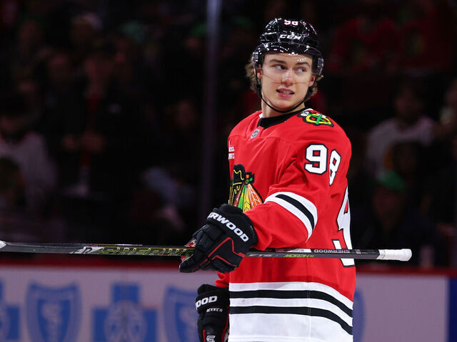 CHICAGO, IL - MARCH 05: Connor Bedard #98 of the Chicago Blackhawks looks on before the start of overtime against the Ottawa Senators on March 5, 2025 at the United Center in Chicago, Illinois.