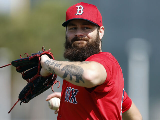 Fort Myers, FL - February 13: Boston Red Sox pitcher Lucas Giolito throws during spring training at JetBlue Park.