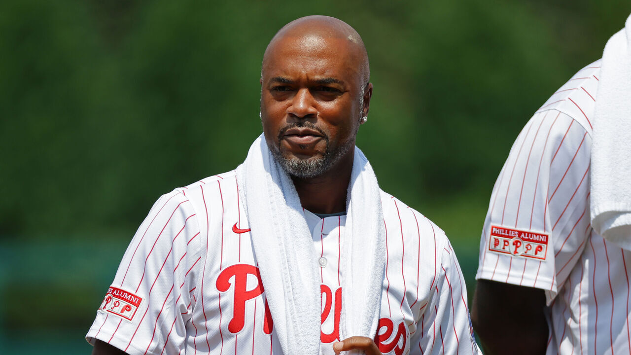 PHILADELPHIA, PENNSYLVANIA - AUGUST 18: Former player Jimmy Rollins of the Philadelphia Phillies participates in alumni weekend festivities before a game against the Washington Nationals at Citizens Bank Park on August 18, 2024 in Philadelphia, Pennsylvania. The Nationals won 6-4.
