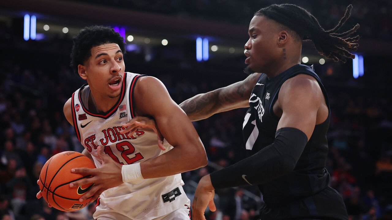 NEW YORK, NEW YORK - MARCH 13: RJ Luis Jr. #12 of the St. John's Red Storm dribbles against Jahmyl Telfort #11 of the Butler Bulldogs in the second half of a quarterfinal game during the Big East Men's Basketball Tournament at Madison Square Garden on March 13, 2025 in New York City. The Red Storm won 78-57.
