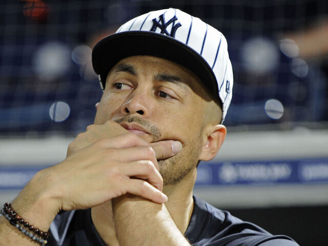 TAMPA, FLORIDA - MARCH 7: Giancarlo Stanton #27 of the New York Yankees during a spring training game against the Toronto Blue Jays at George M. Steinbrenner Field on March 7, 2025 in Tampa, Florida.