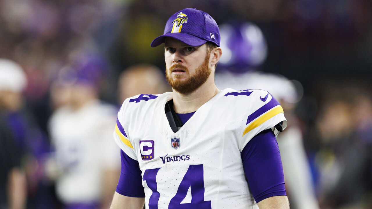 GLENDALE, ARIZONA - JANUARY 13: Sam Darnold #14 of the Minnesota Vikings on the sideline during the second half of the NFC Wild Card Playoff game against the Los Angeles Rams at State Farm Stadium on January 13, 2025 in Glendale, Arizona.