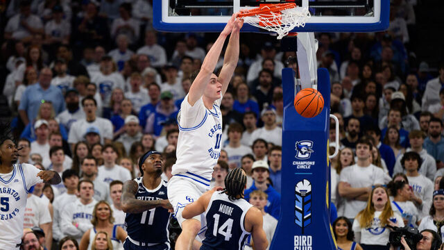 OMAHA, NE - MARCH 08: Creighton Bluejays center Ryan Kalkbrenner (11) goes up for a dunk during the men's college basketball game between the Butler Bulldogs and Creighton Bluejays on March 8, 2025, at the CHI Health Center in Omaha, NE.