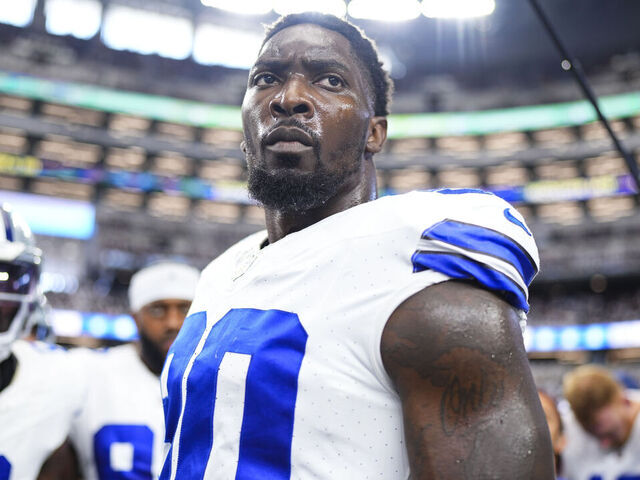 ARLINGTON, TX - SEPTEMBER 22: DeMarcus Lawrence #90 of the Dallas Cowboys leads a huddle prior to an NFL football game against the Baltimore Ravens at AT&T Stadium on September 22, 2024 in Arlington, Texas.