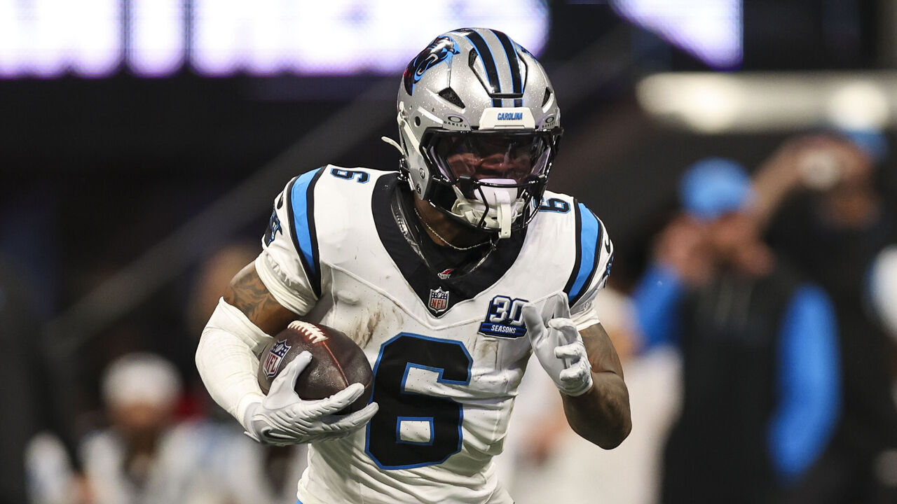ATLANTA, GEORGIA - JANUARY 05: Miles Sanders #6 of the Carolina Panthers runs the ball during an NFL football game against the Atlanta Falcons at Mercedes-Benz Stadium on January 5, 2025 in Atlanta, Georgia.