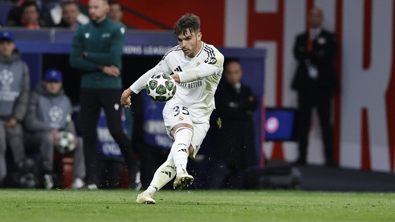Madrid, Spain - March 12: Raul Asencio of Real Madrid CF controls the ball during the UEFA Champions League 2024/25 Round of 16 Second Leg match between Atletico de Madrid and Real Madrid C.F. at Estadio Cívitas Metropolitano on March 12, 2025 in Madrid, Spain.