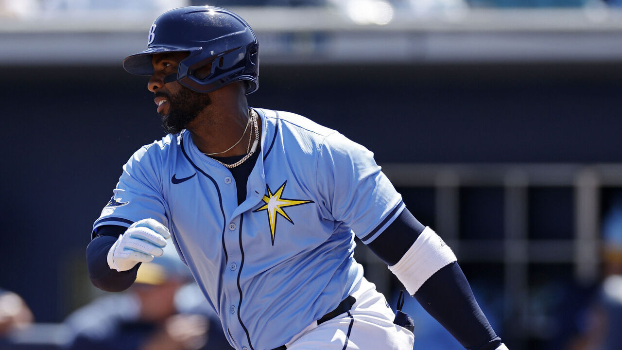 PORT CHARLOTTE, FL - MARCH 13: Tampa Bay Rays first baseman Yandy Díaz (2) singles to right field to drive in two runs in the fourth inning during an MLB Spring Training baseball game against the Washington Nationals on March 13, 2025 at Charlotte Sports Park in Port Charlotte, Florida.