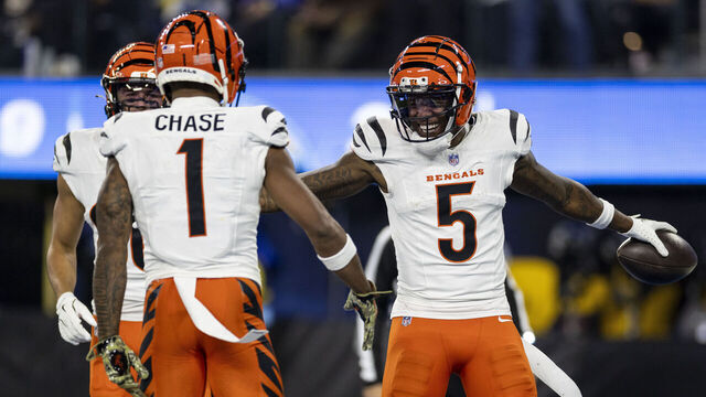 INGLEWOOD, CALIFORNIA - NOVEMBER 17: Tee Higgins #5 of the Cincinnati Bengals celebrates with teammates after scoring a touchdown during an NFL Football game against the Los Angeles Chargers at SoFi Stadium on November 17, 2024 in Inglewood, California.