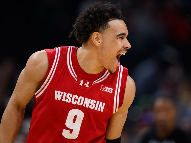 INDIANAPOLIS, IN - MARCH 14: Wisconsin Badgers guard John Tonje (9) celebrates on the court during the men's Big Ten tournament college basketball game between the UCLA Bruins and Wisconsin Badgers on March 14, 2025, at Gainbridge Fieldhouse in Indianapolis, IN.