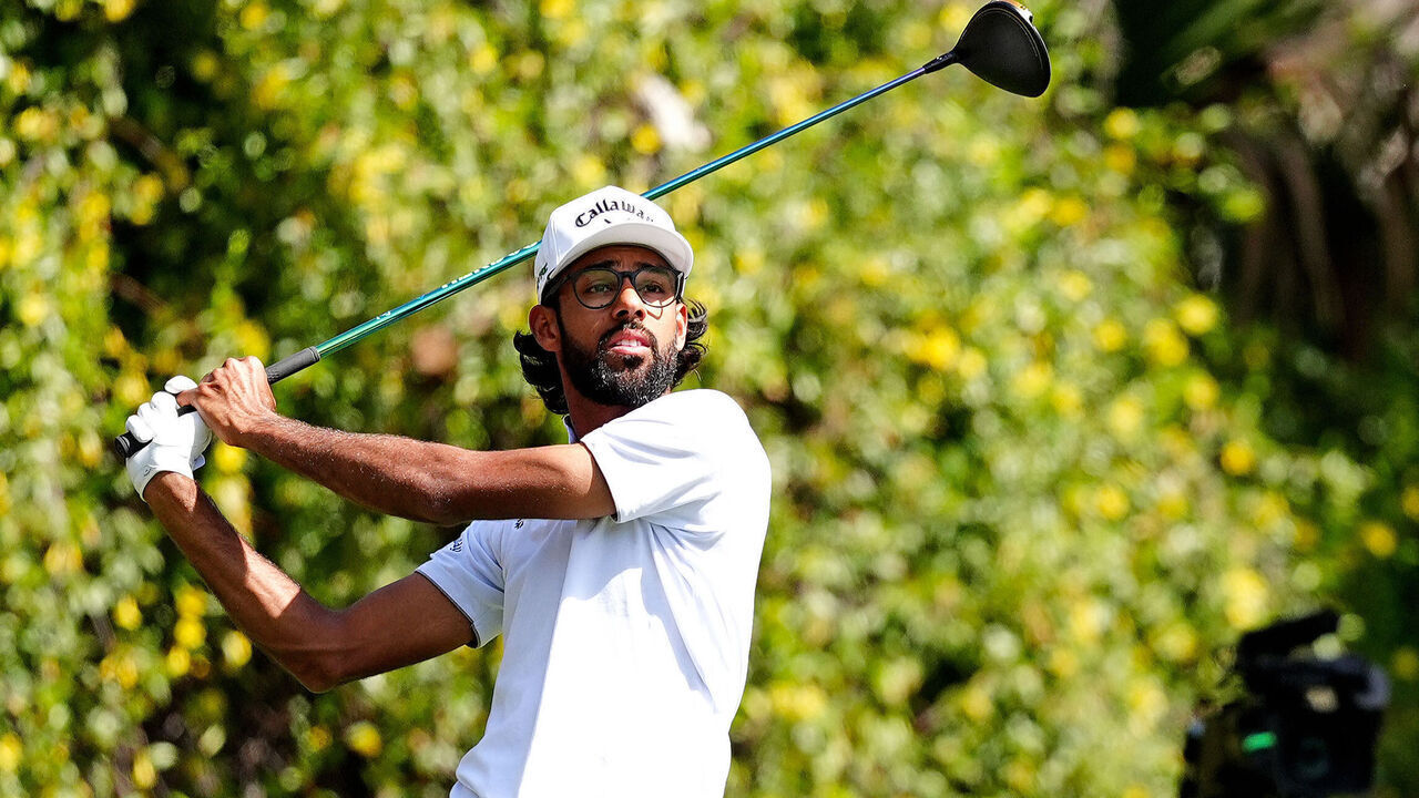 PONTE VEDRA BEACH, FL - MARCH 14: PGA golfer Akshay Bhatia plays his tee shot on the 2nd hole during the second round of The Players Championship at the Stadium Course at TPC Sawgrass on March 14, 2025, at Ponte Verde Beach, Florida.