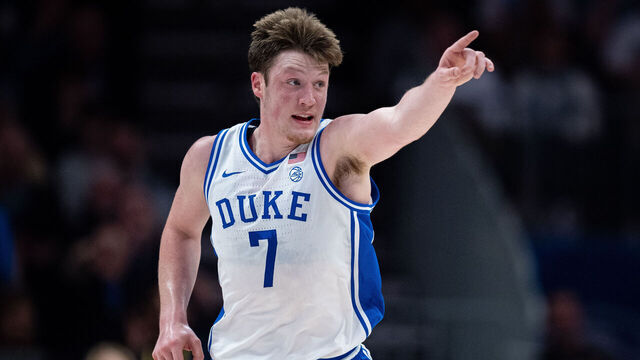 CHARLOTTE, NORTH CAROLINA - MARCH 14: Kon Knueppel #7 of the Duke Blue Devils reacts in the first half against the North Carolina Tar Heels during the semifinal round of the ACC men's basketball tournament at Spectrum Center on March 14, 2025 in Charlotte, North Carolina.