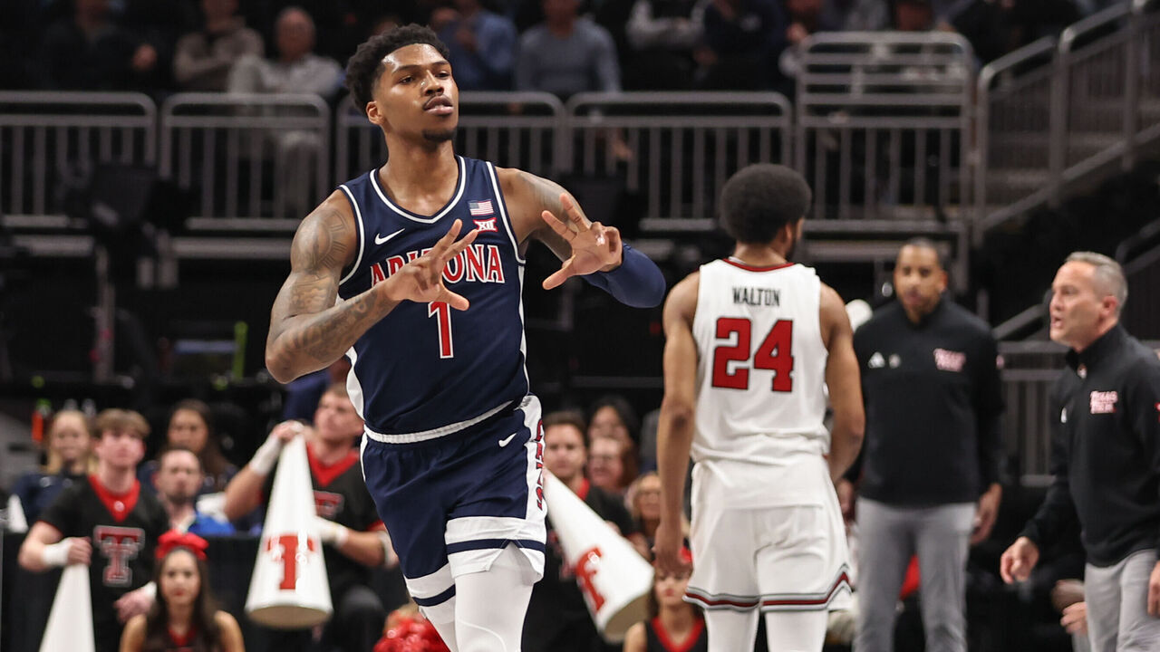 KANSAS CITY, MO - MARCH 14: Arizona Wildcats guard Caleb Love (1) celebrates after making a three in the first half of a Big 12 tournament semifinal game between the Arizona Wildcats and Texas Tech Red Raiders on March 14, 2025 at T-Mobile Center in Kansas City, MO.