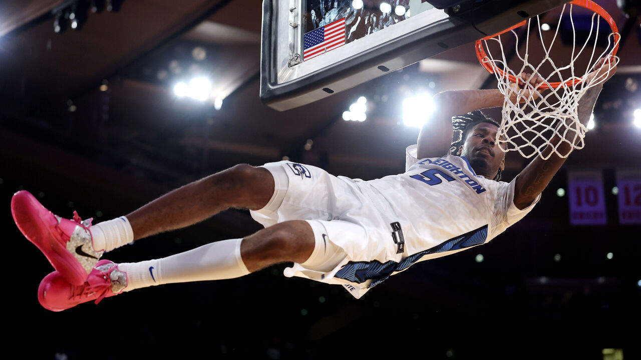 NEW YORK, NEW YORK - MARCH 14: Jamiya Neal #5 of the Creighton Bluejays dunks the ball in the second half of a semifinal game against the Connecticut Huskies during the Big East Men's Basketball Tournament at Madison Square Garden on March 14, 2025 in New York City. The Bluejays won 71-62.