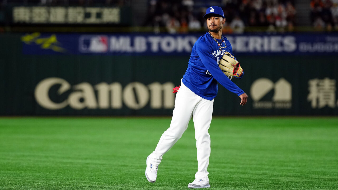 TOKYO, JAPAN - MARCH 15: Mookie Betts #50 of the Los Angeles Dodgers warms-up in the outfield prior to the game between the Los Angeles Dodgers and the Yomiuri Giants at Tokyo Dome on Saturday, March 15, 2025 in Tokyo, Japan.
