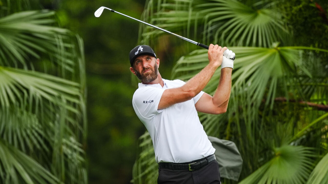 SINGAPORE, SINGAPORE - MARCH 15: Dustin Johnson of 4 Aces GC tees off at 2nd hole on day two of LIV Golf Singapore at Sentosa Golf Club on March 15, 2025 in Singapore, Singapore.