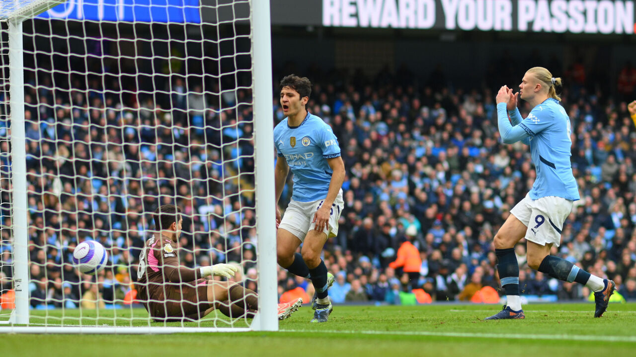 MANCHESTER, ENGLAND - MARCH 15: Abdukodir Khusanov of Manchester City scores own goal as Erling Haaland of Manchester City reacts during the Premier League match between Manchester City FC and Brighton & Hove Albion FC at Etihad Stadium on March 15, 2025 in Manchester, England.