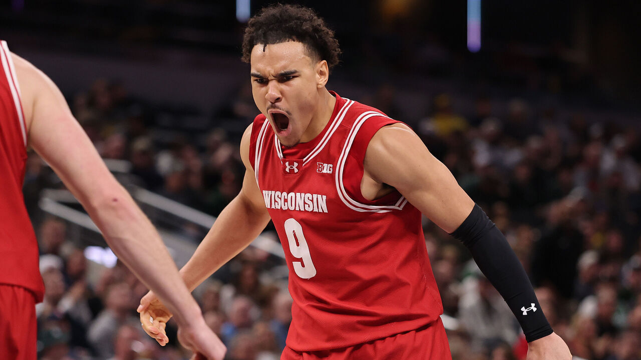 INDIANAPOLIS, INDIANA - MARCH 15: John Tonje #9 of the Wisconsin Badgers celebrates against the Michigan State Spartans during the second half in the Big Ten men's basketball tournament semifinals at Gainbridge Fieldhouse on March 15, 2025 in Indianapolis, Indiana.